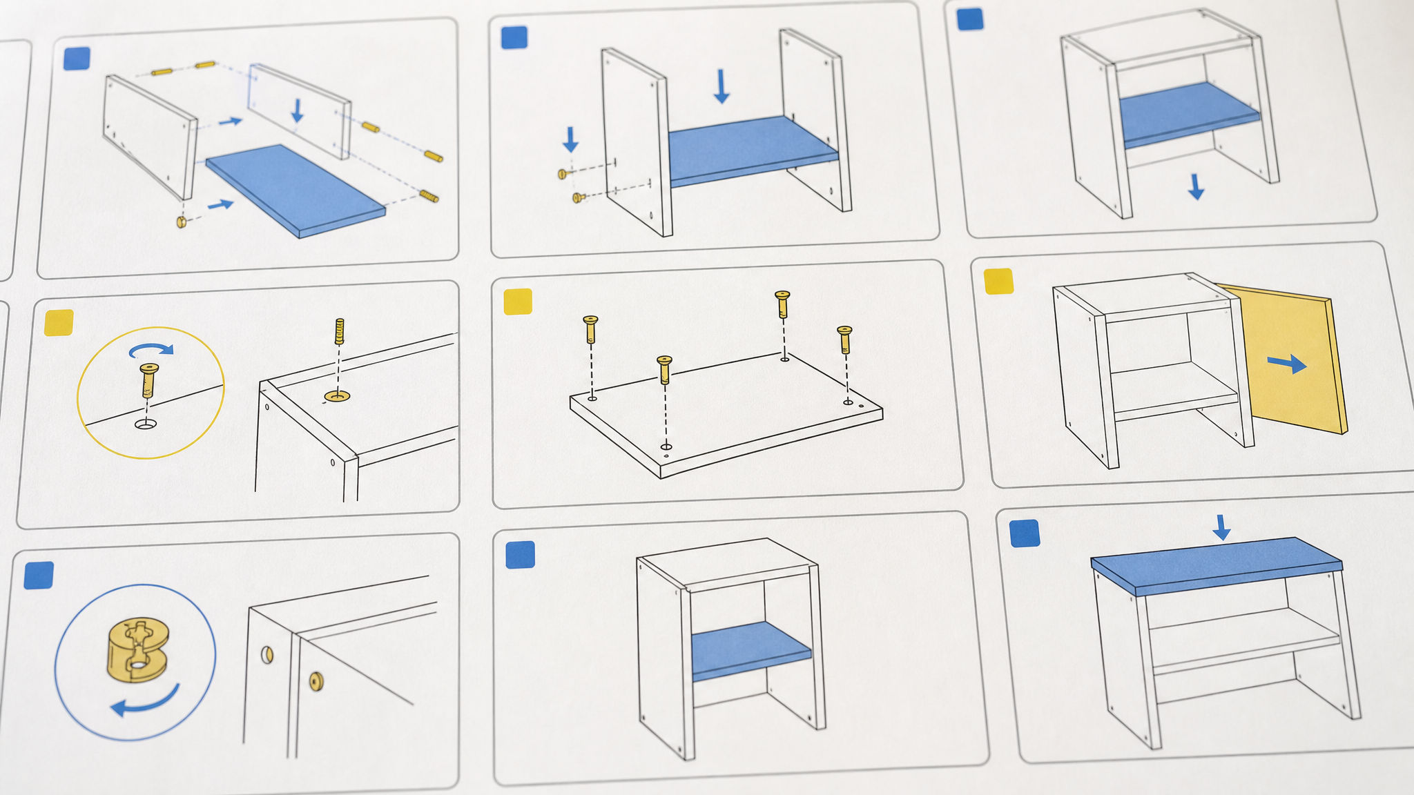 Close view of anonymous instruction-style diagrams arranged in a strict grid with blue and yellow blocks