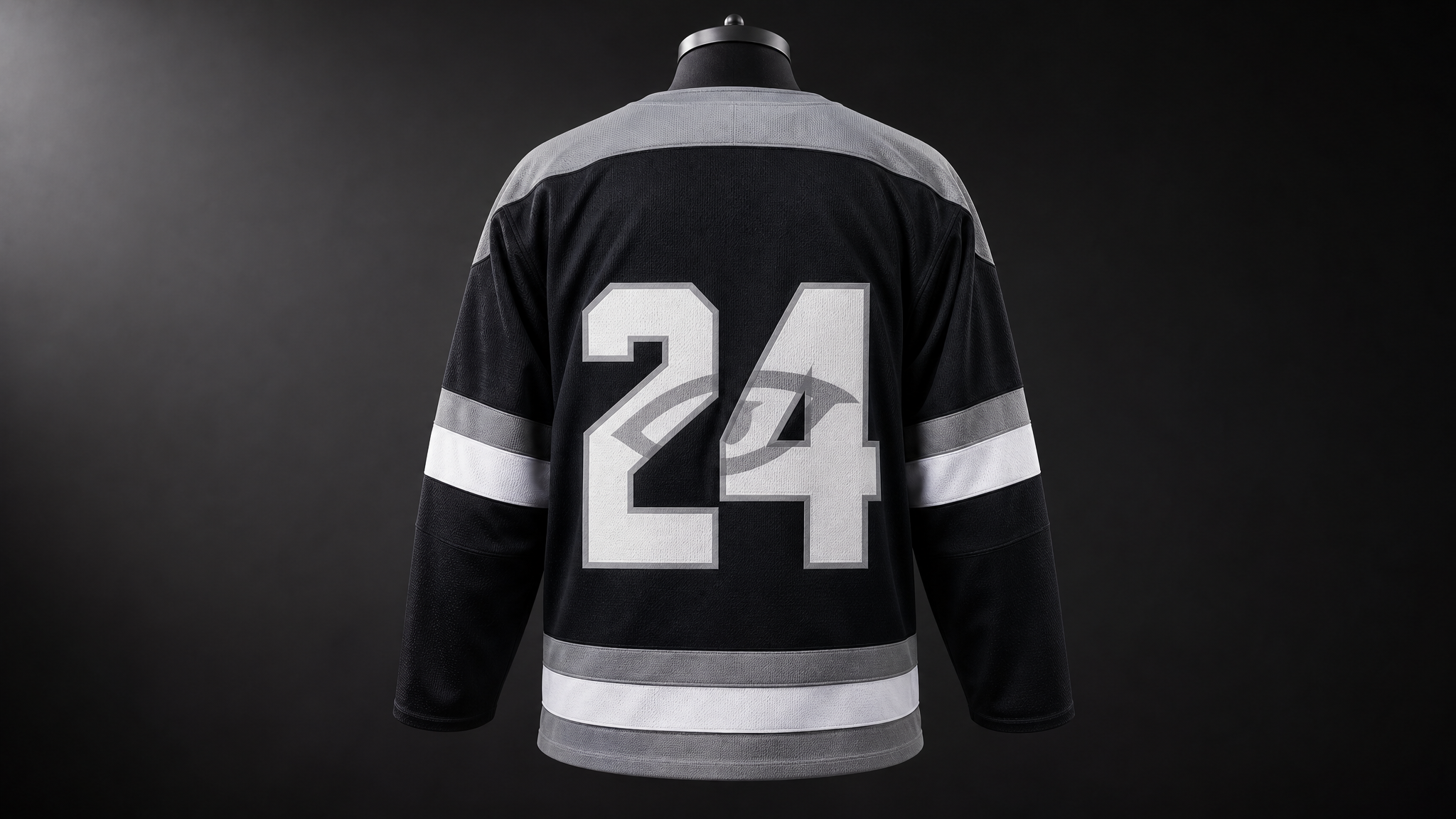 Back view of a hockey jersey showing large numbers with a subtle eye silhouette embedded inside them